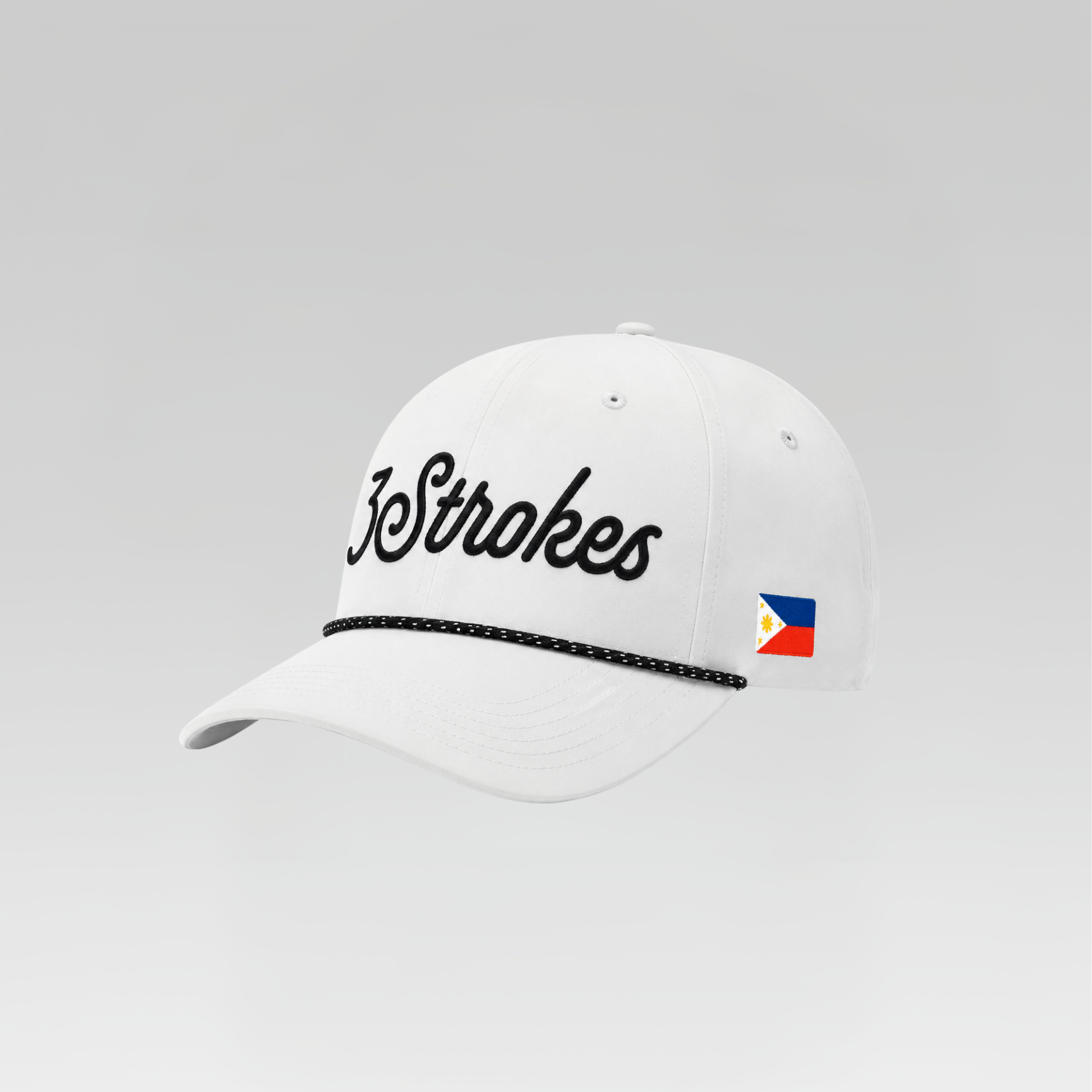 White cap with '3 Strokes' logo and a small flag on a gray background