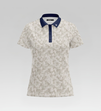White floral-patterned polo shirt with navy collar on a light gray background