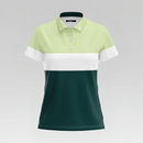 A women's short-sleeve polo shirt with a color-blocked design, featuring a light yellow-green upper section, a white middle band, and a dark forest green lower section, shown on a neutral gray background.